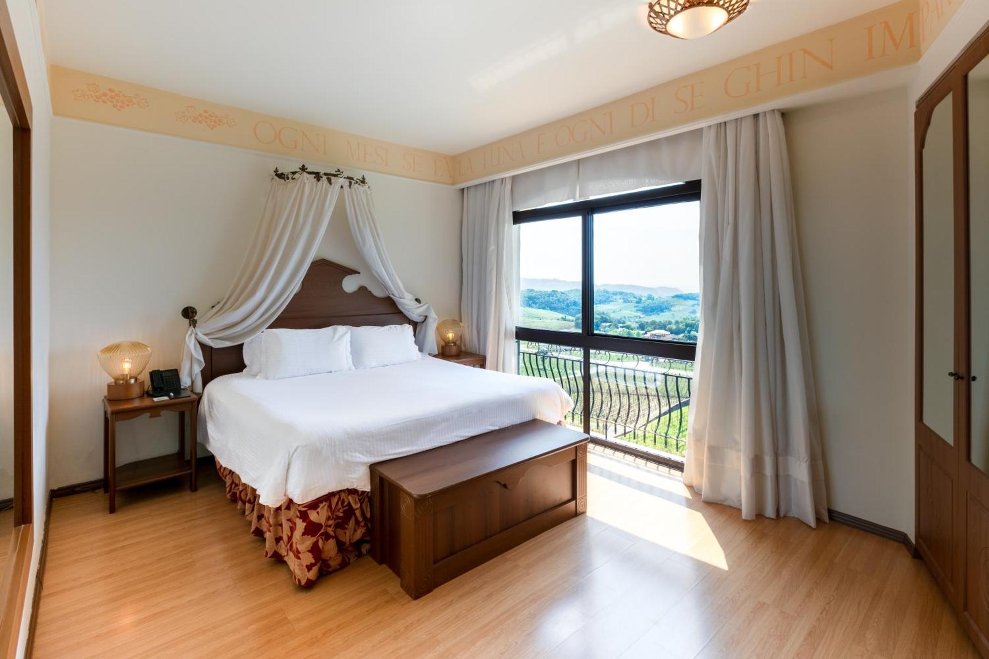 Spa Do Vinho Condominio Vitivinicola Bento Gonçalves Buitenkant foto A bedroom at the hotel