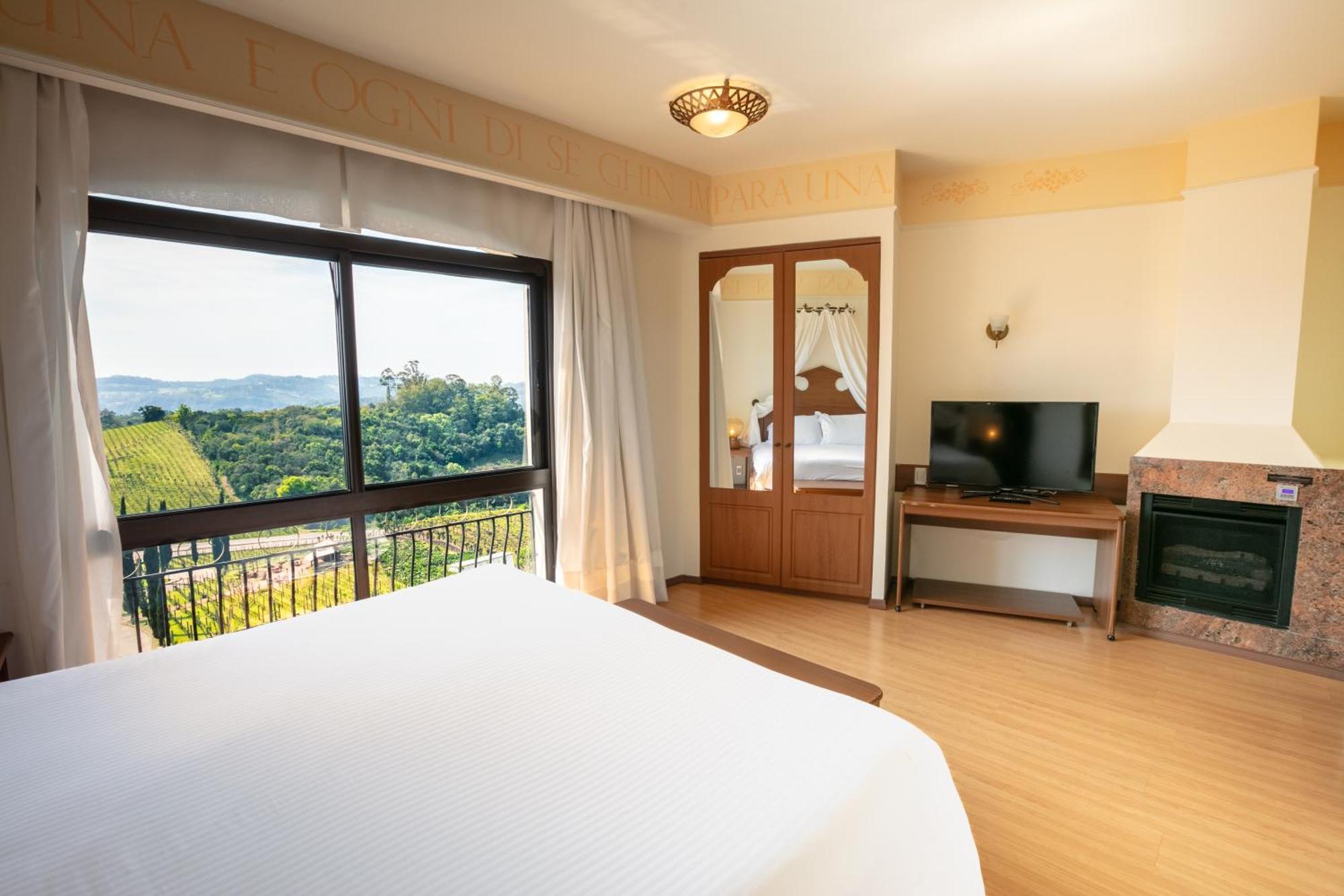 Spa Do Vinho Condominio Vitivinicola Bento Gonçalves Buitenkant foto A bedroom at the hotel