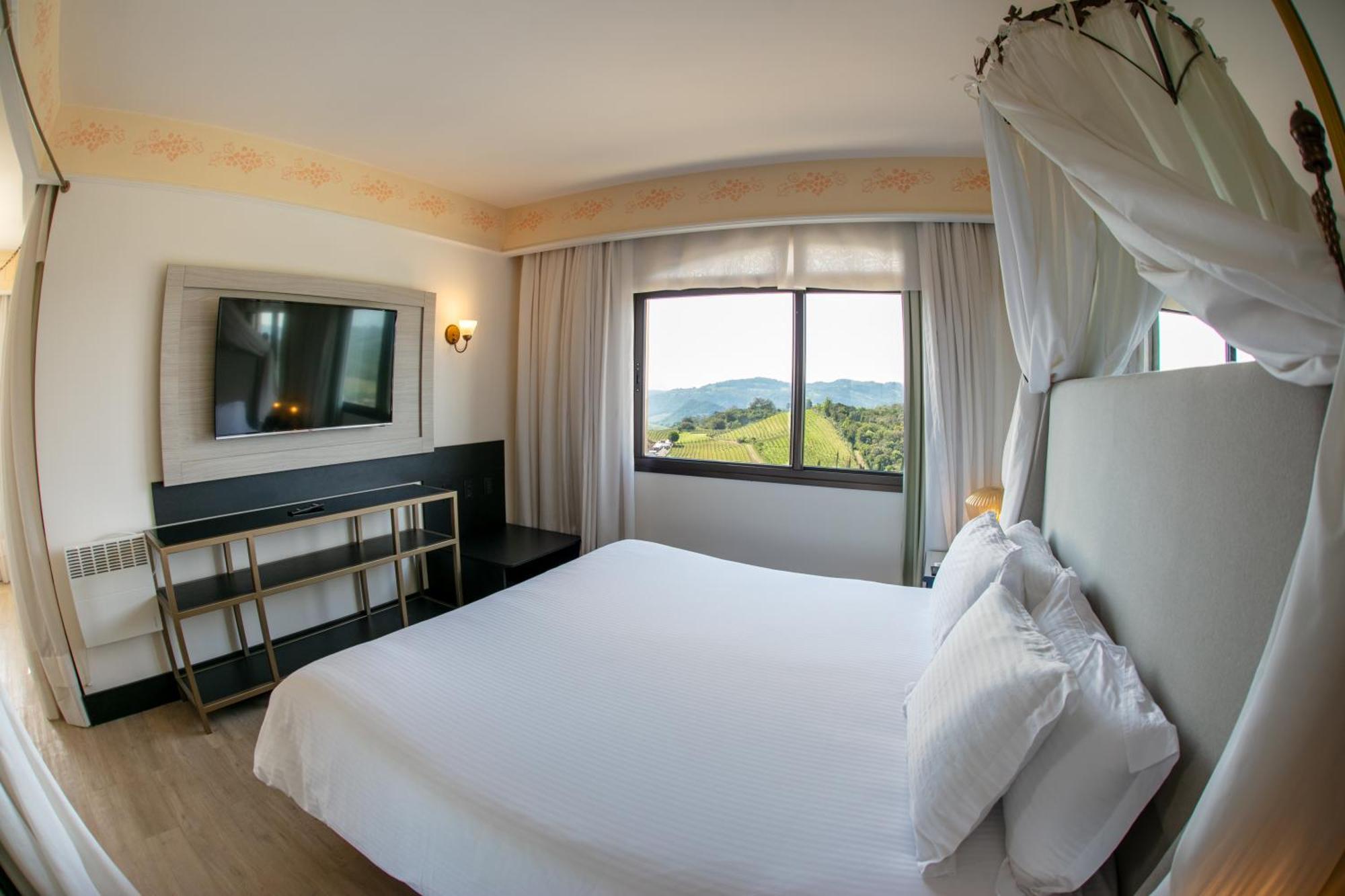 Spa Do Vinho Condominio Vitivinicola Bento Gonçalves Buitenkant foto A bedroom at the hotel